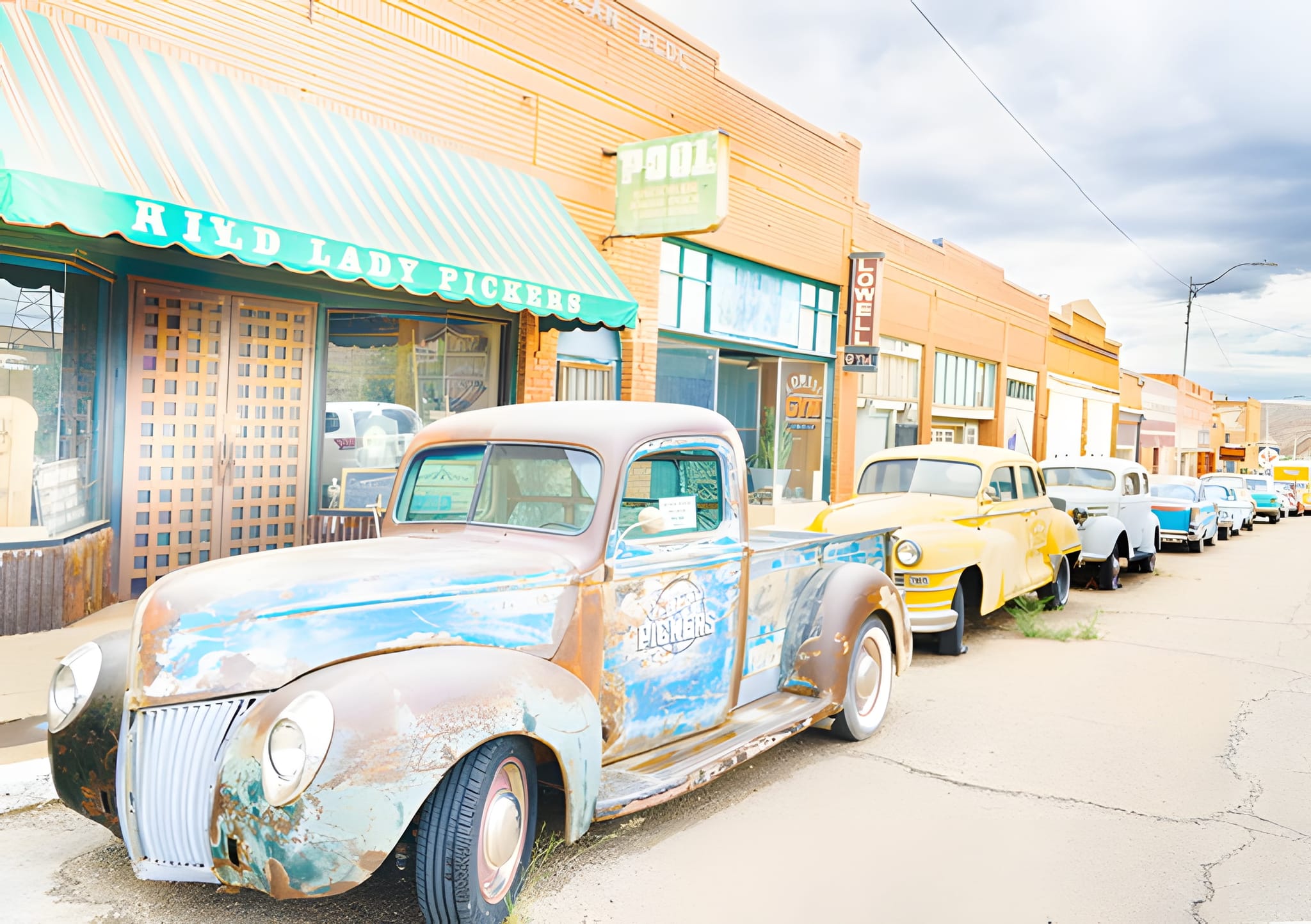 Antique shop storefront and a vintage pickup, Lowell — by Ed Shpritz