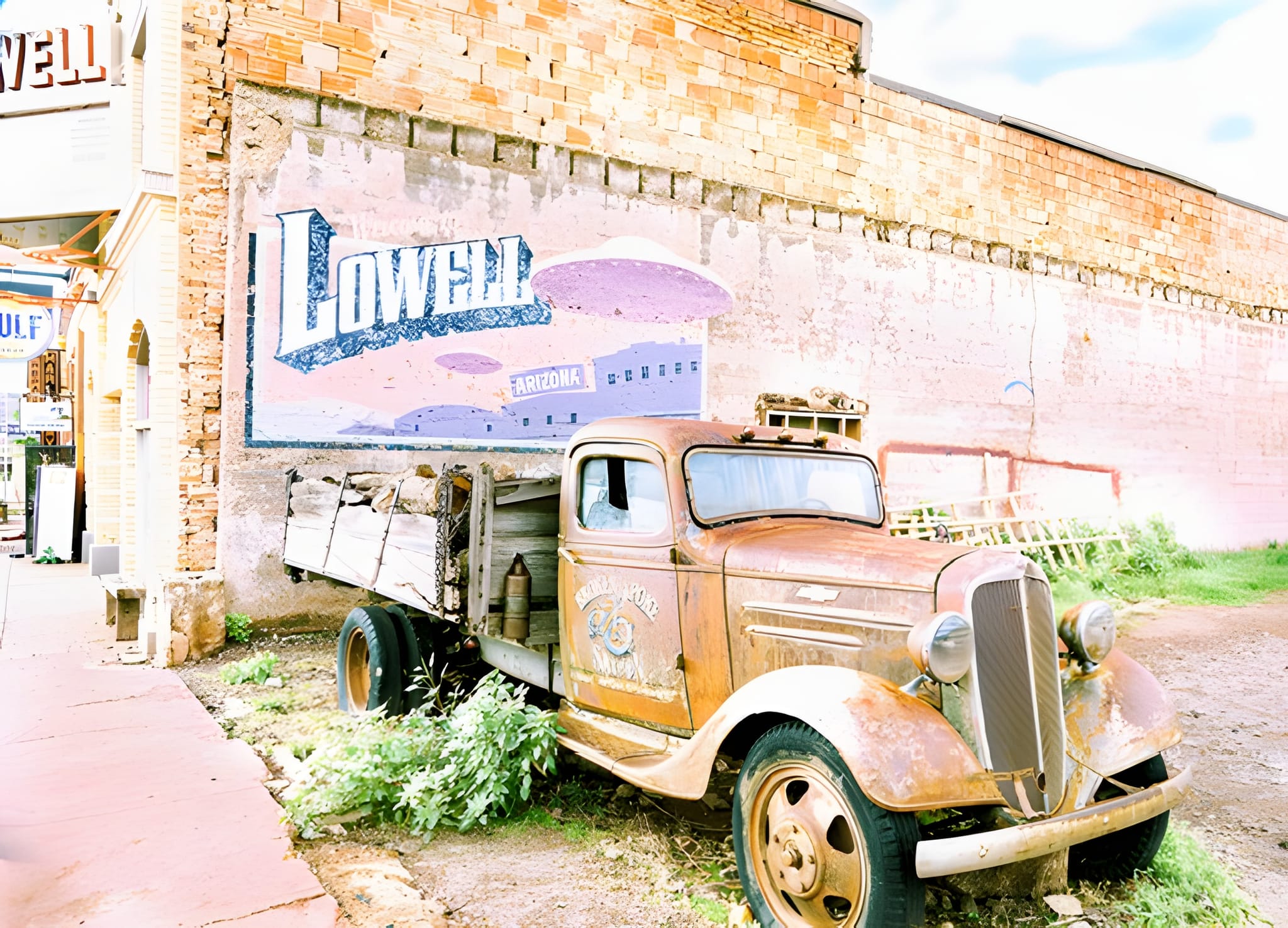 Lowell wall mural and a vintage flatbed truck — by Ed Shpritz
