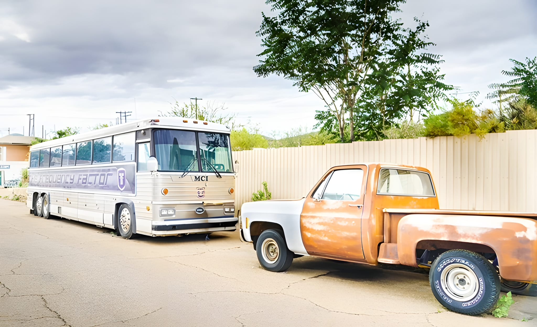 A vintage bus and pickup, Lowell — by Ed Shpritz