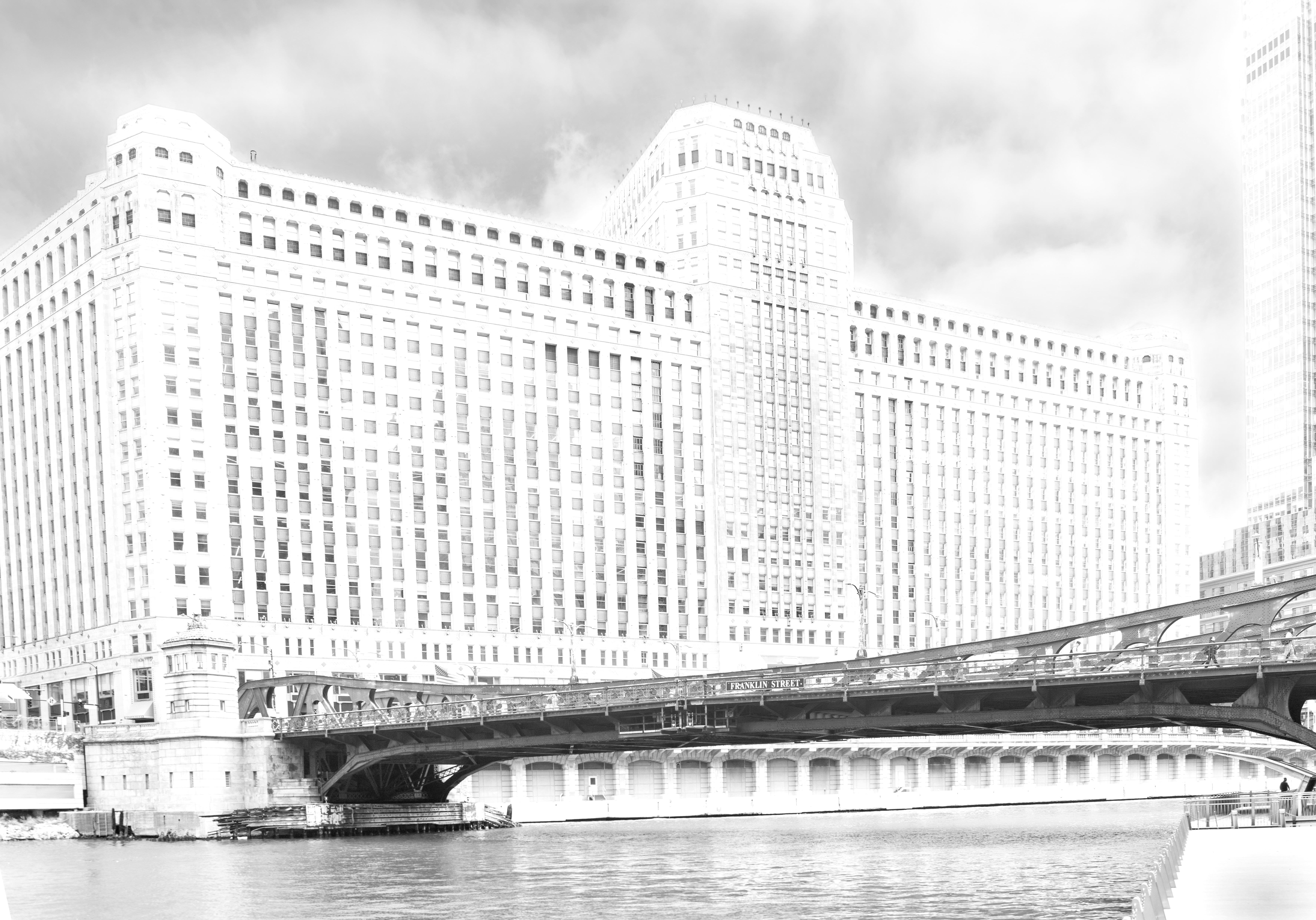 The Merchandise Mart and a bridge over the Chicago River in high key white